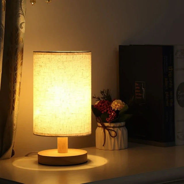 Solid wood table lamp with a cylindrical linen shade