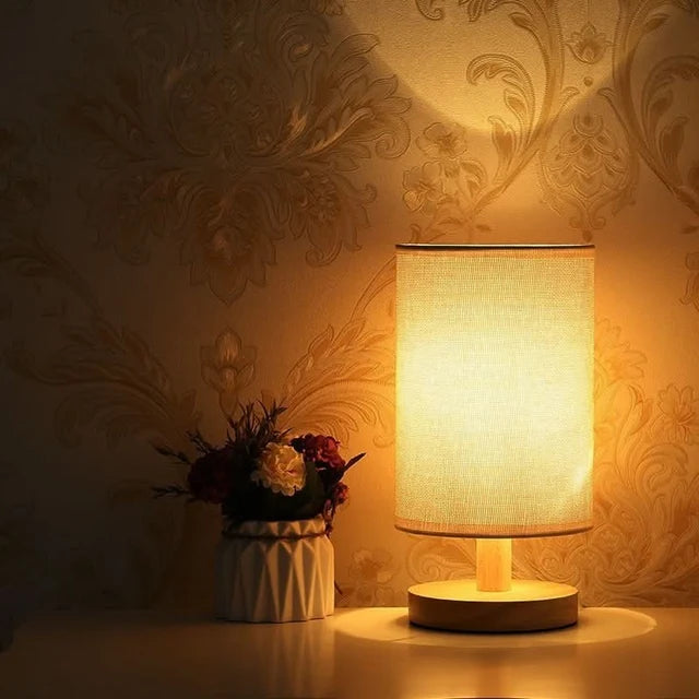 Solid wood table lamp with a cylindrical linen shade